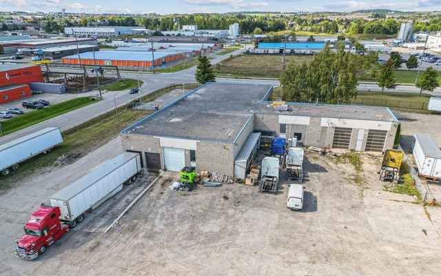 building, outside, trucks